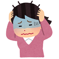 頭抱えている人