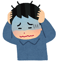 頭抱えている人